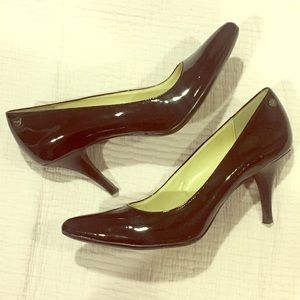 Calvin Klein “Ashley” Black Patent Leather Pumps